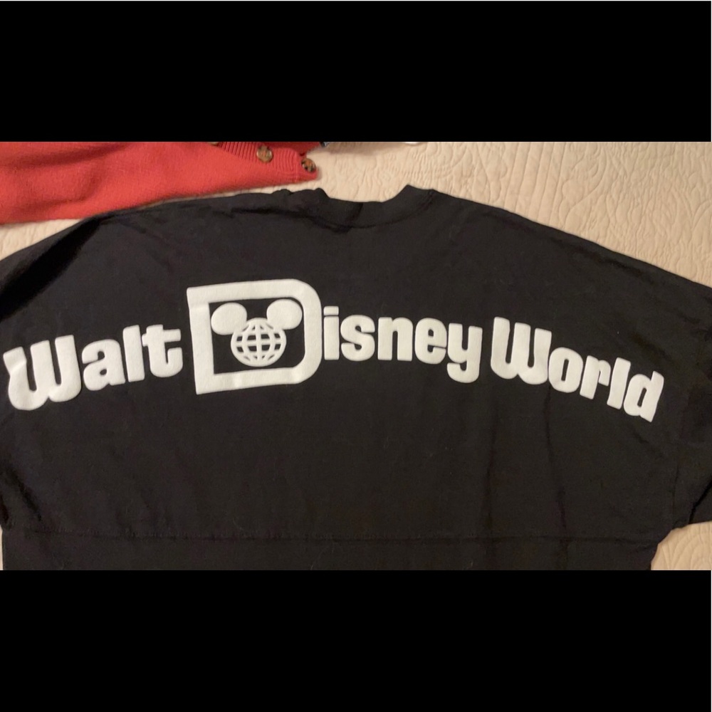 Disney spirit jersey, never worn, size medium but is quite large
